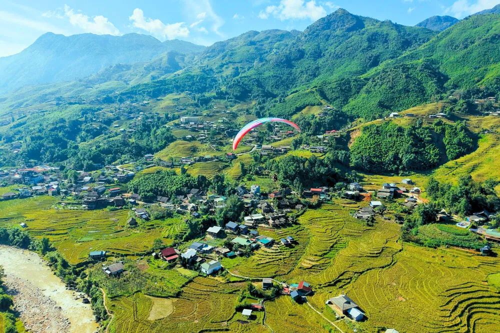 Soaring over valleys and terraced fields in Sa Pa, Vietnam
